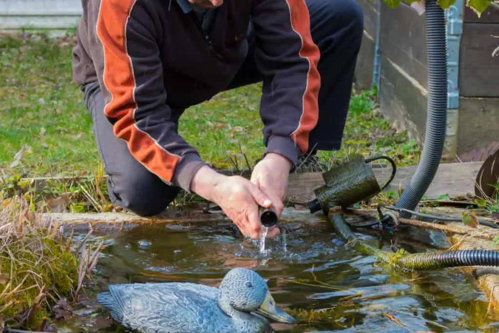 adjusting a garden pond